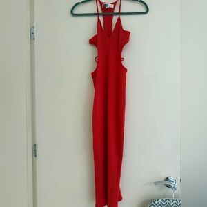 Red ribbed mid dress. Cut out detail details.